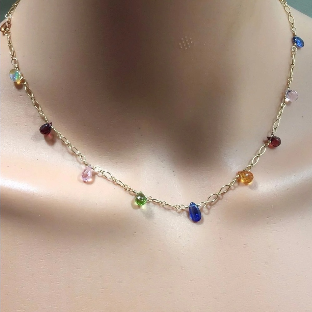 A very delicate chain link with multi gemstones